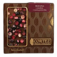 Czekolada mleczna z miodem i czarną porzeczką 85g Cortez